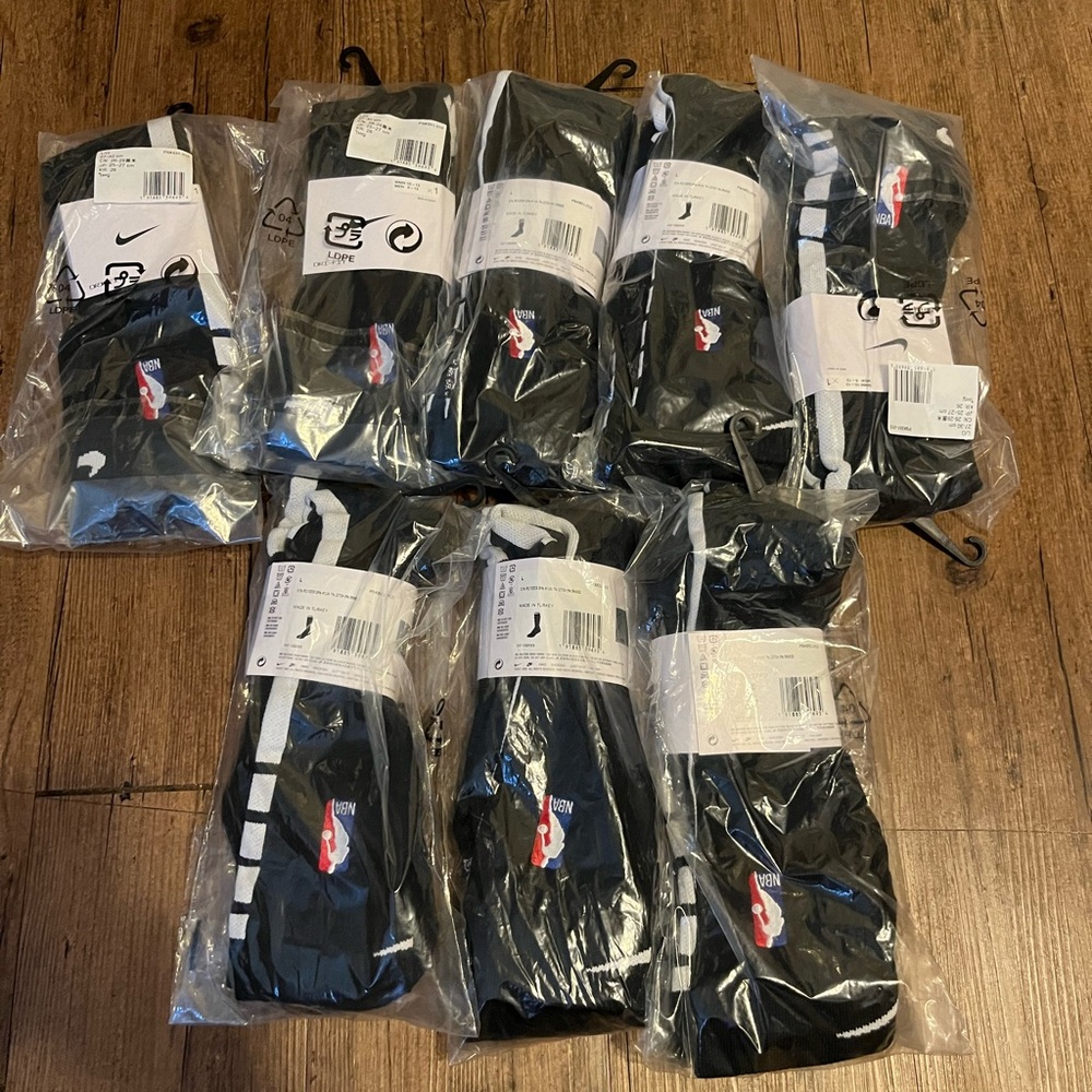 8 pairs of black Nike socks